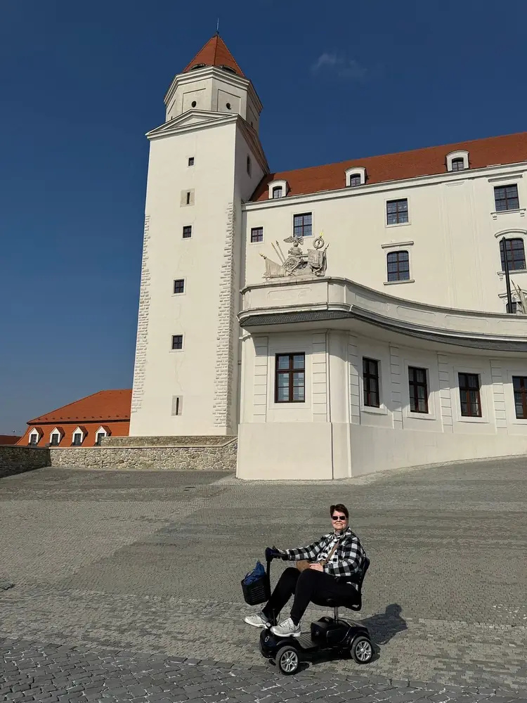 Mobile4Ever customer on a mobility scooter at Bratislava Castle