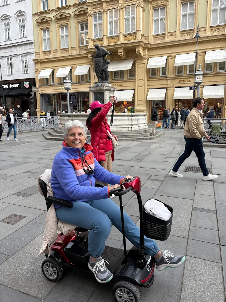 Mobile4Ever customer on a mobility scooter at Hoher Markt, Vienna