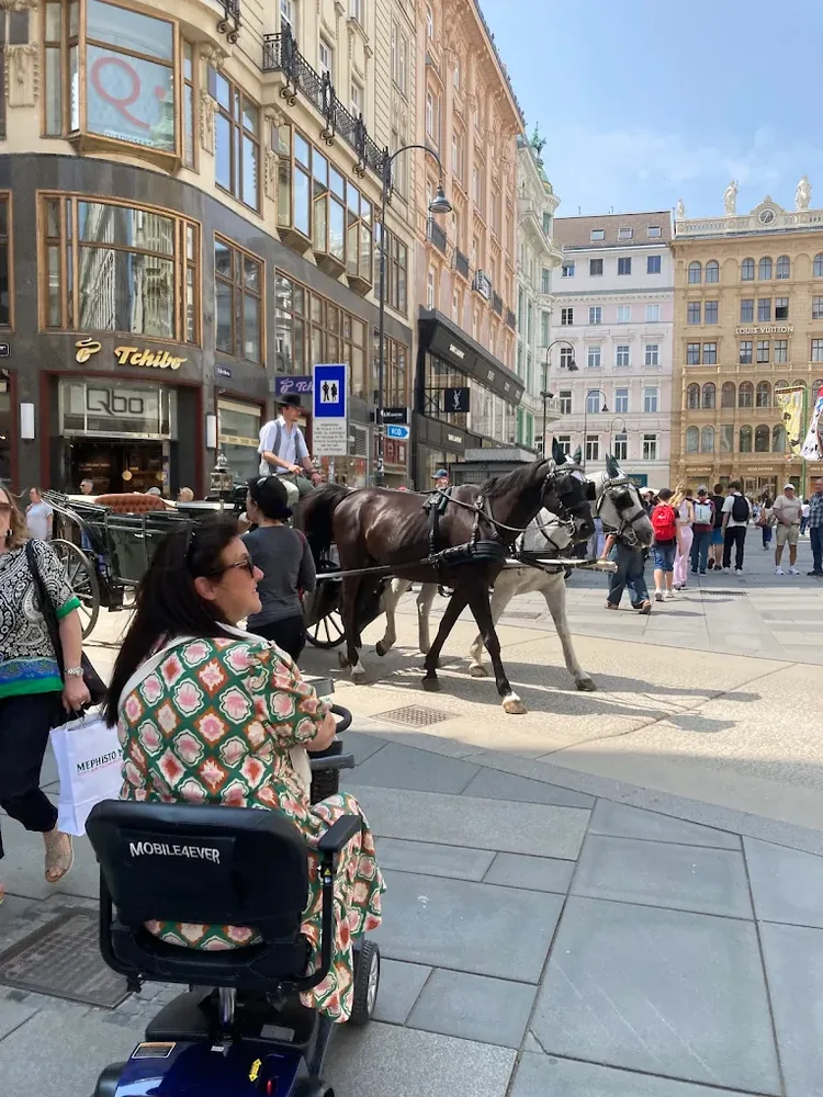 Mobile4Ever customer on a mobility scooter at Vienna Old Town