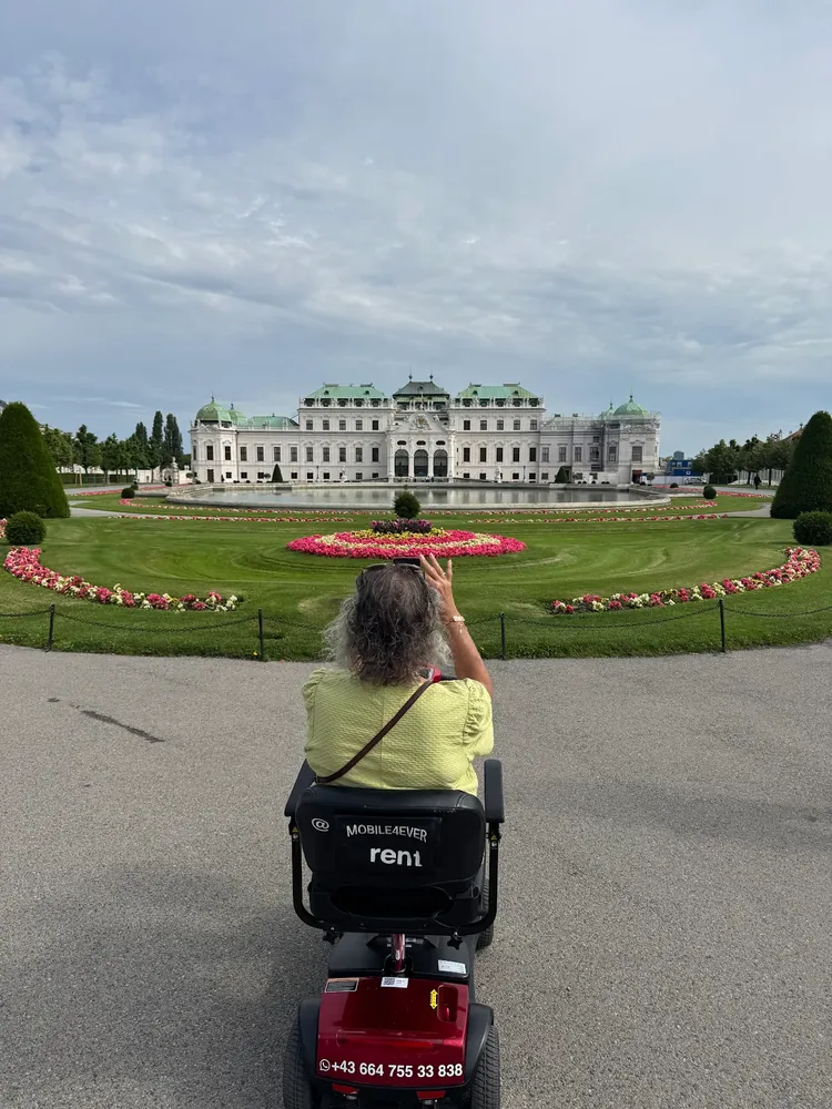 Mobile4Ever customer on a mobility scooter at Belvedere Palace, Vienna